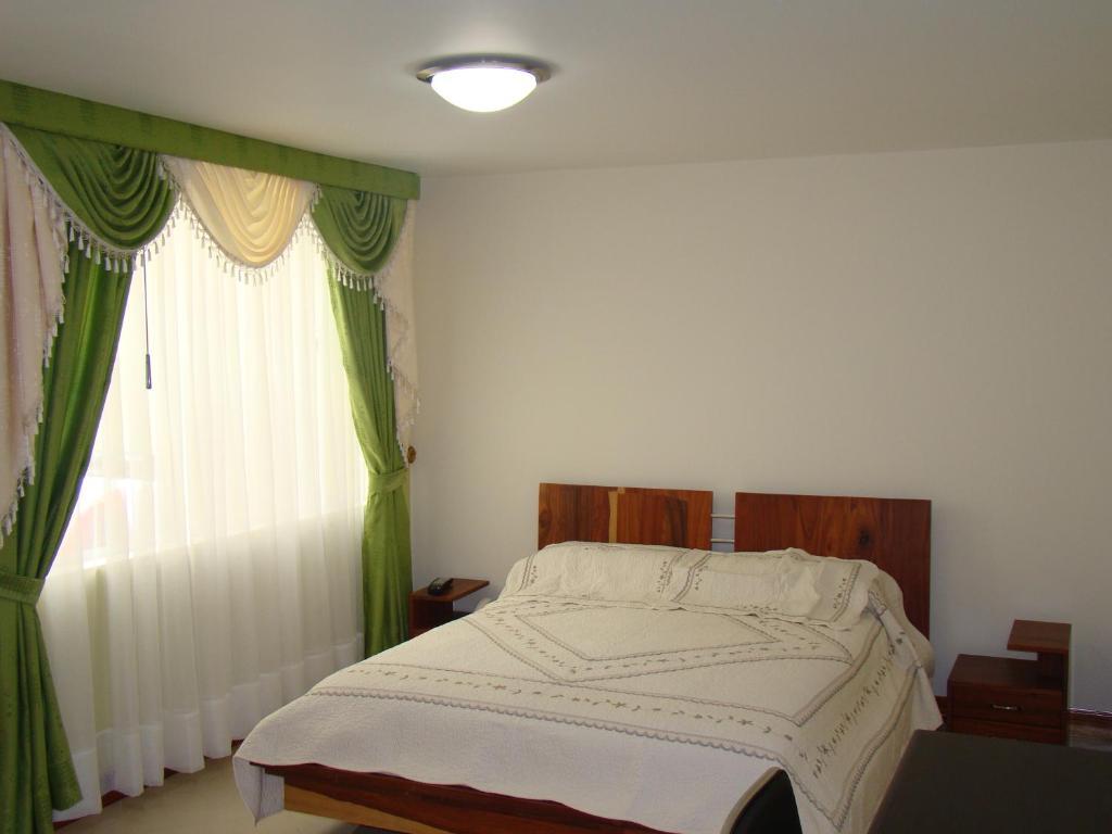 Apartahotel Vincent Suites Pasto Zimmer foto